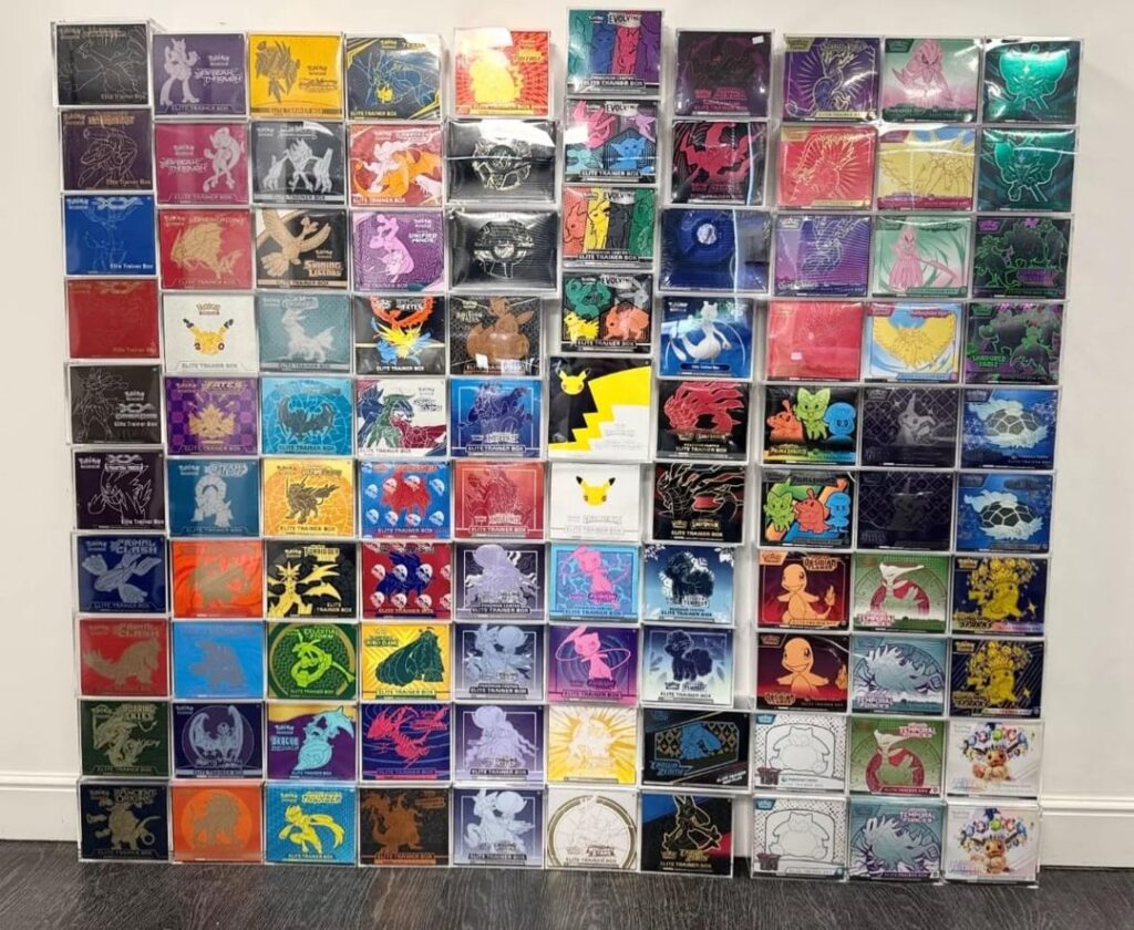 Finally collected ALL 100 Pokemon Elite Trainer Boxes