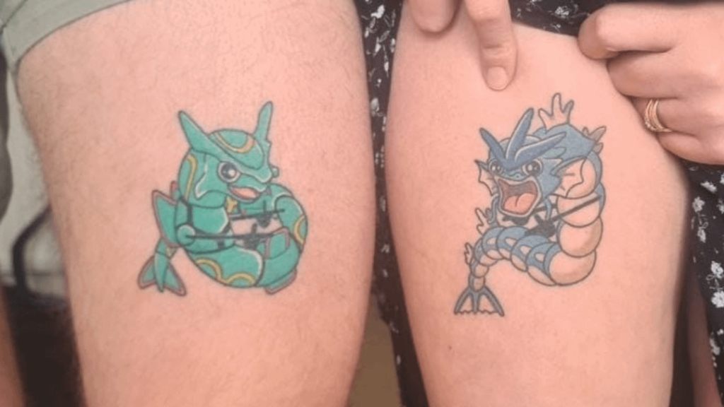 Matching tattoos of me and my wife's favourite Pokémon.