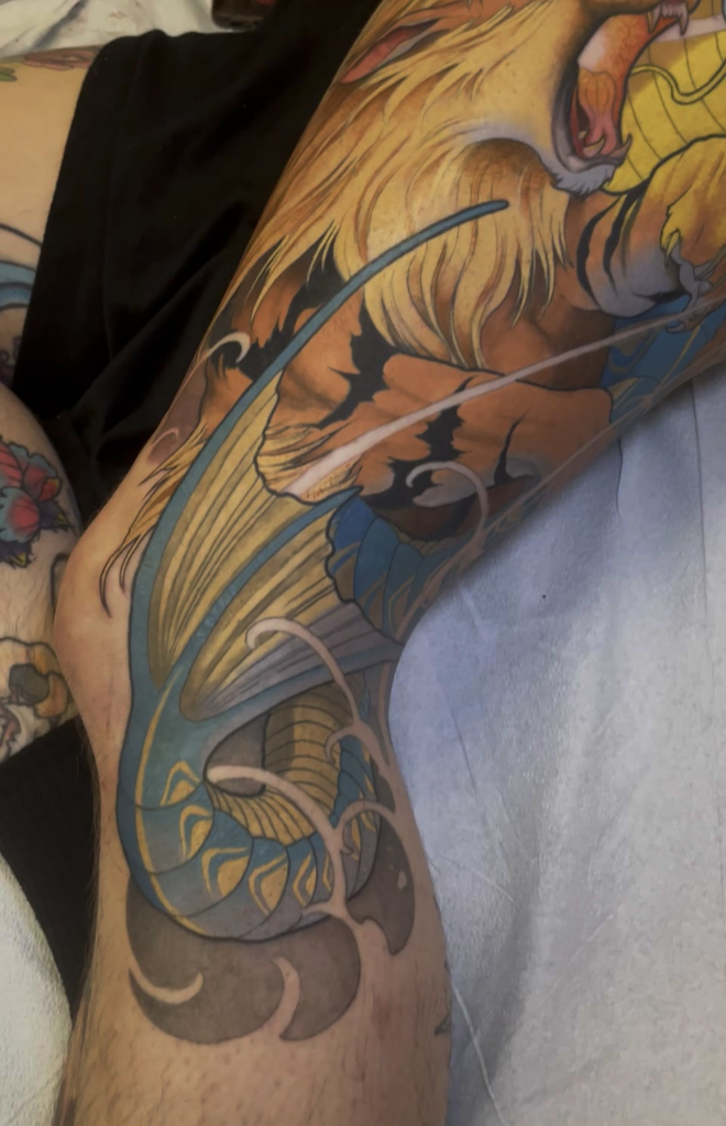 Tattoo I did of an Arcanine fighting a Gyarados