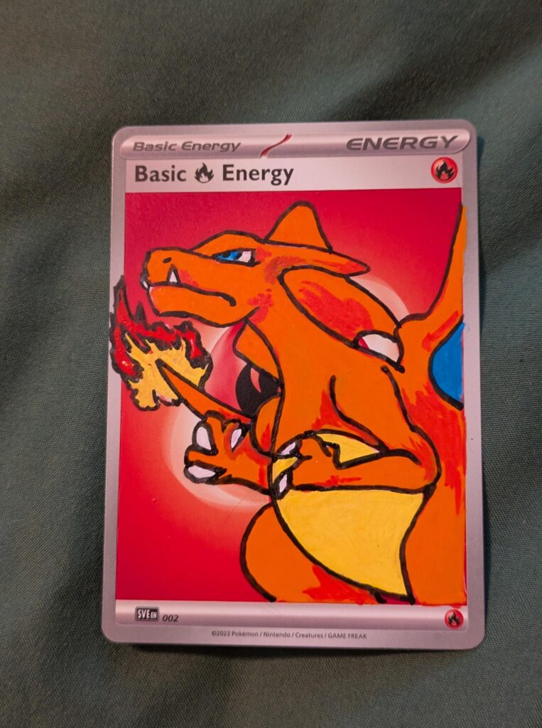 Someone bought my spare charizard 151 SIR so decided to break out the paints and include a neat unique freebie for them