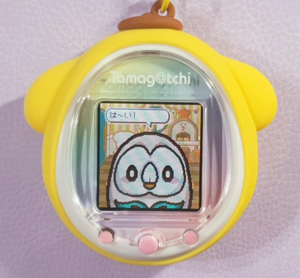Carrying around Rowlet (Tamagotchi Smart Mod)