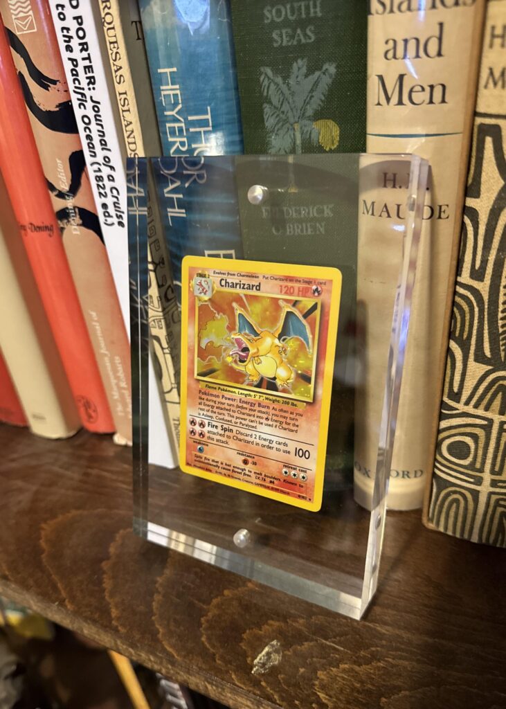 I received a plaque for 10 years at my corporate job. I took it apart and put my Charizard in it instead