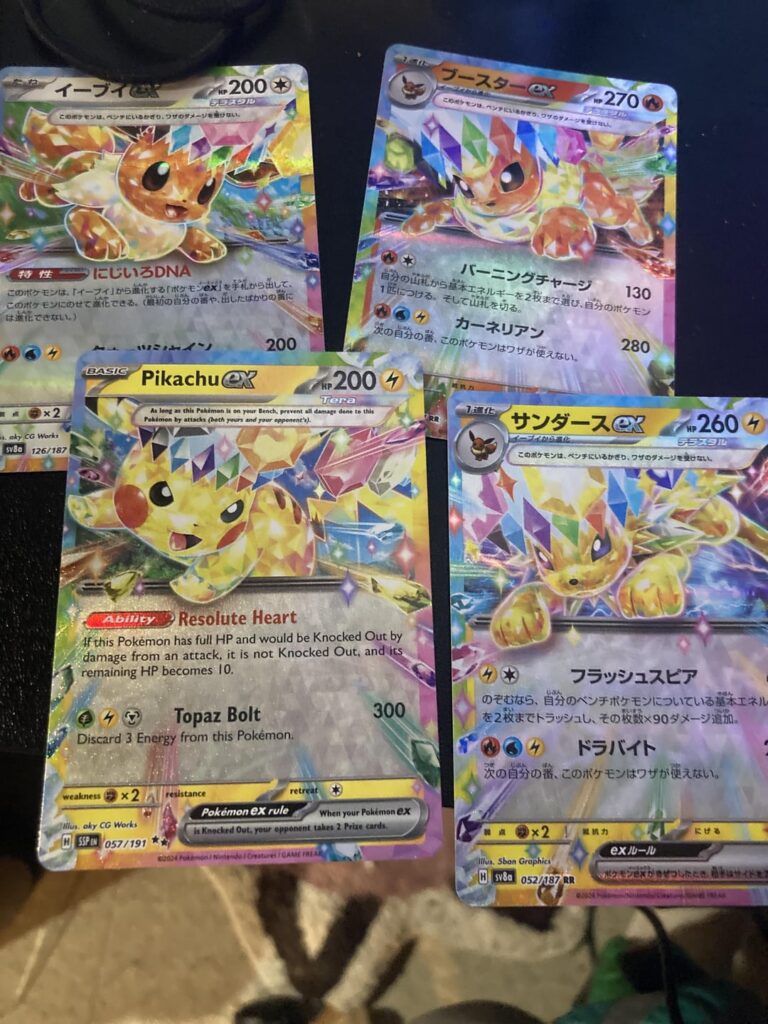 I bought and opened my very first trestial eeveelutions box.