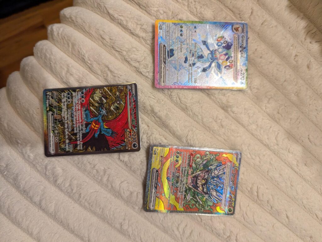Finally get my hands on some prismatic tins. Sell my girlfriends mom 2 of them and she pulls this from a pack...
