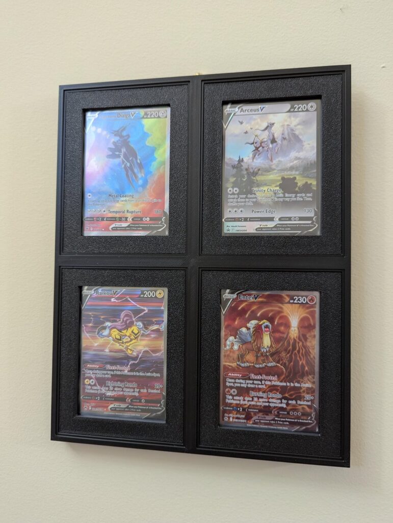 I designed a wall mounted frame for cards in toploaders