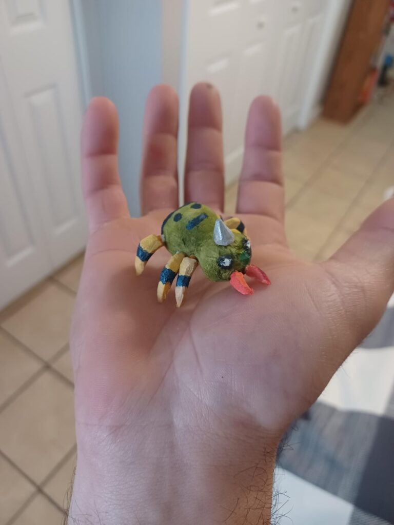 A wooden Spinarak I carve and painted for my all johto pokemon wood carving project. (15/100).