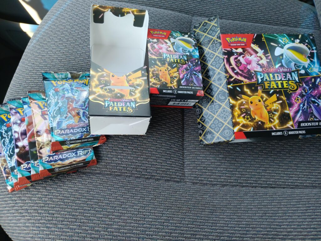 My Paldean Fates booster bundle had Paradox Rift packs inside it...