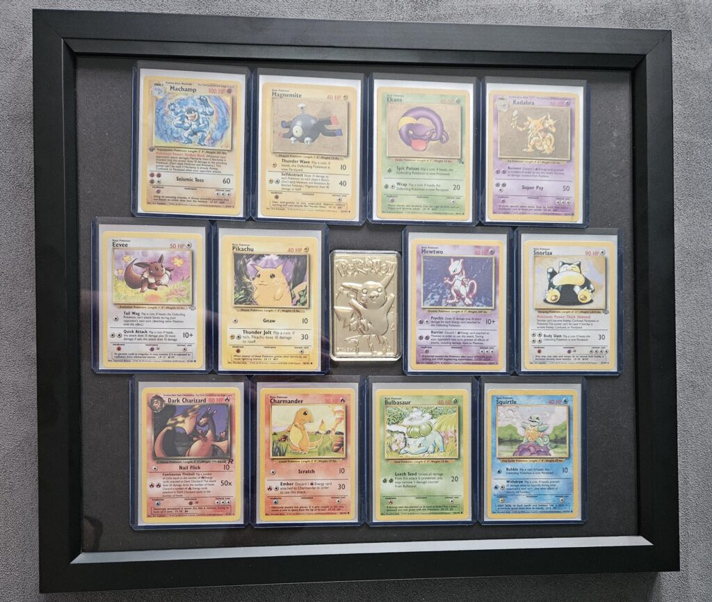 By Request - my late brother's self-made golden holos in a display case with my personal collection.