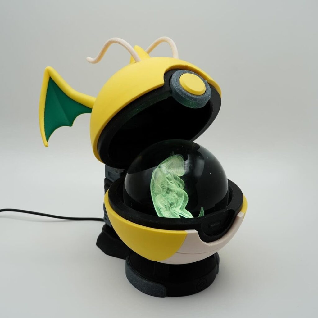 I 3D printed a Dragonite-inspired Pokéball display lamp! [OC]