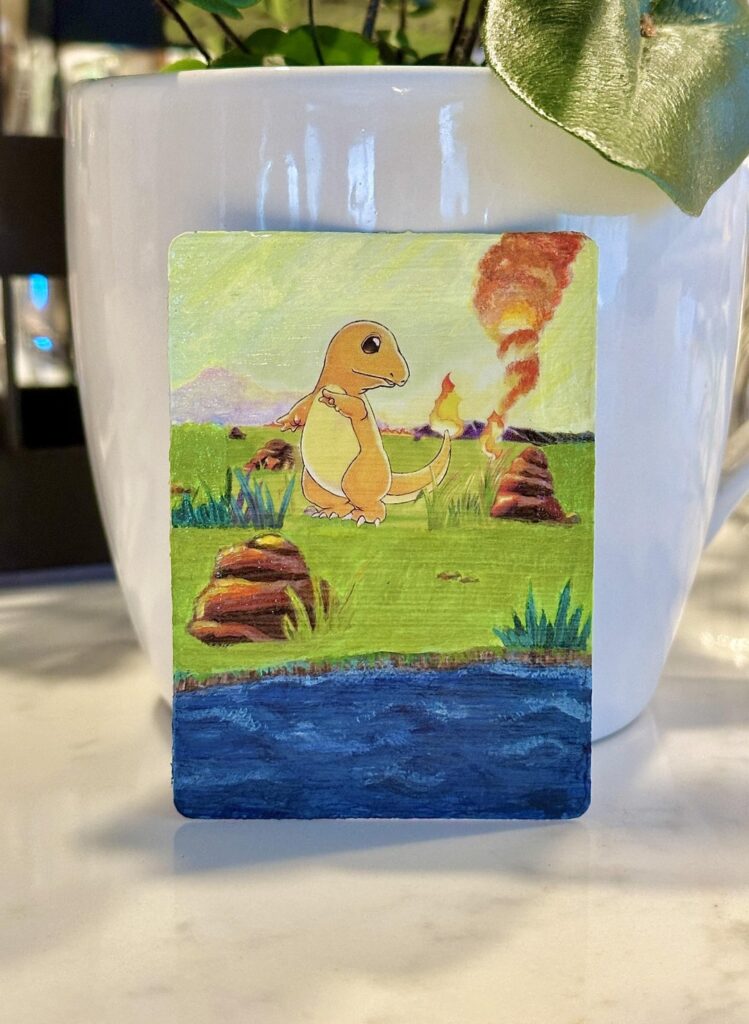 Painted on a Charmander Card