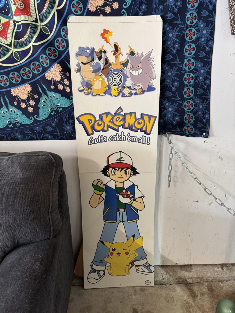 Curious on what this 1999 banner from a game store is worth