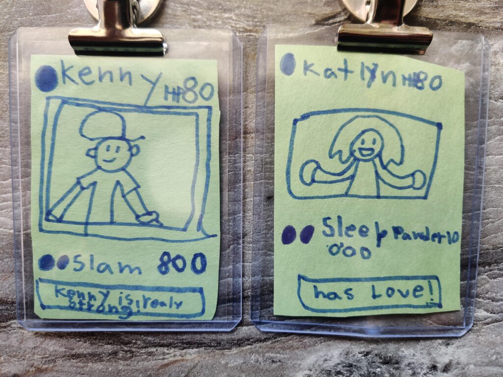 My daughter made custom Pokemon cards of me and my wife.