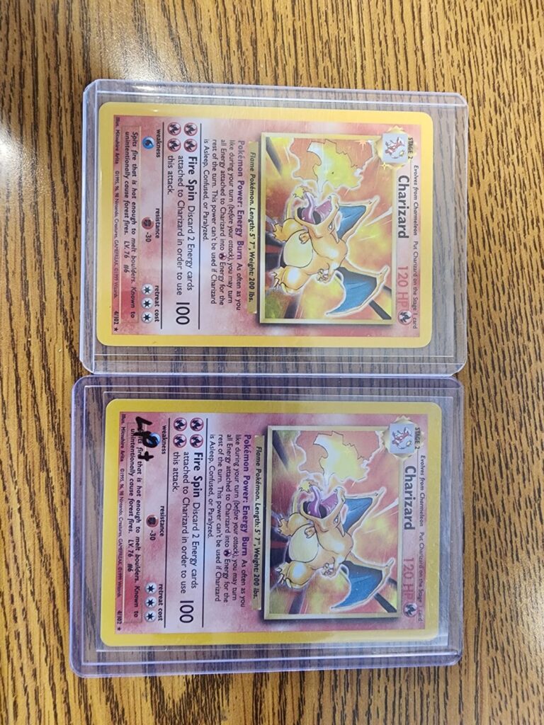 Two Base Set Charizards, Two different looks.