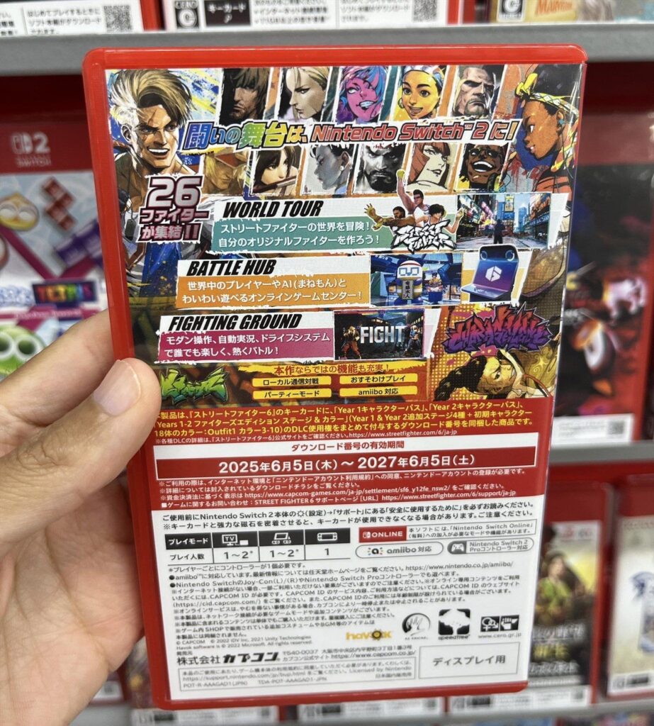 Street Fighter 6 character pass is reported to be on a DLC code/voucher slip, the game key card only downloads the base game as seen in the Japanese version retail packaging