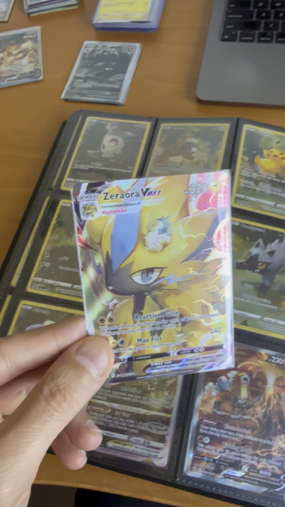 After 1 year and 7 months of ripping packs, making deals, and trading cards, today, I finally put the last card of my Crown Zenith master set into the binder