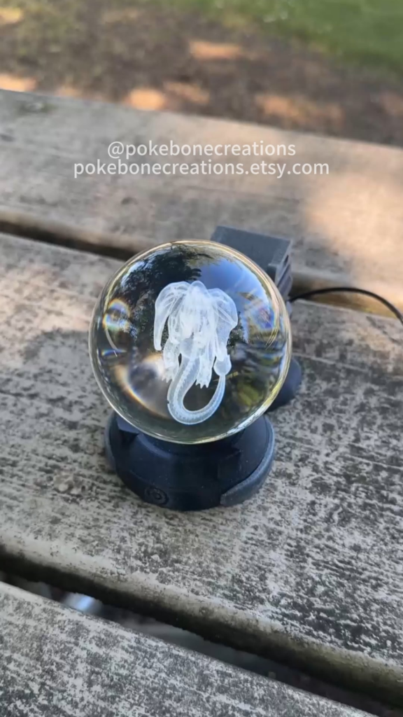 I 3D printed a Charizard-inspired Pokéball lamp with a glowing crystal Charizard inside! Check out the video! [OC]