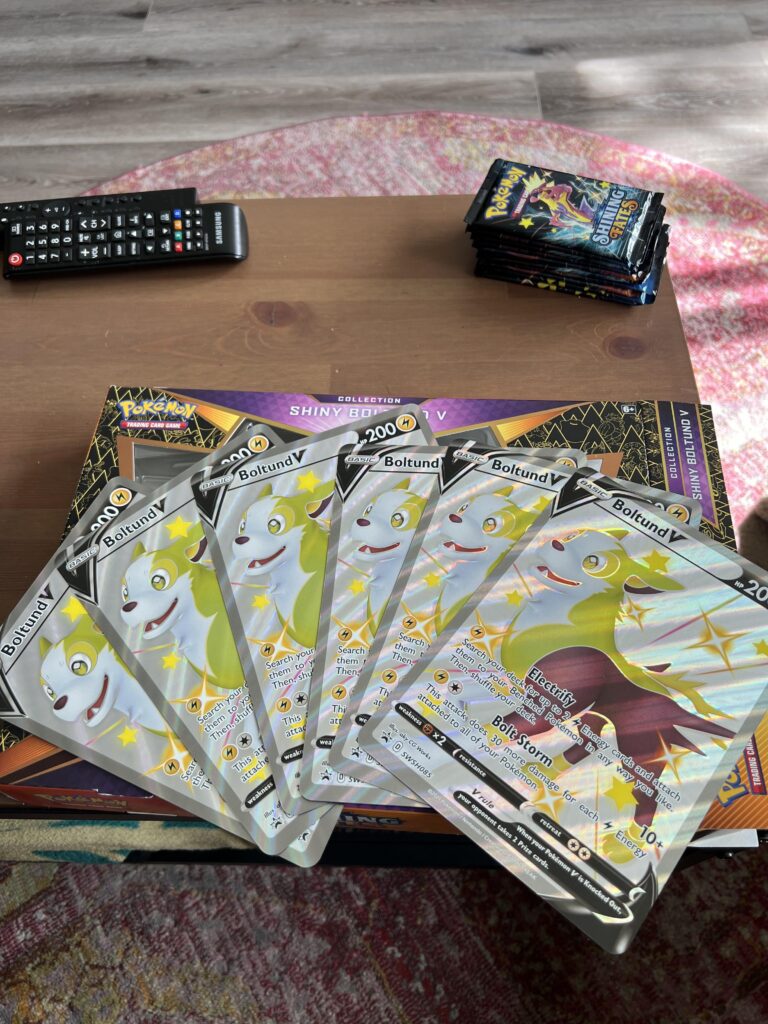 6 oversized shiny boltund V cards?