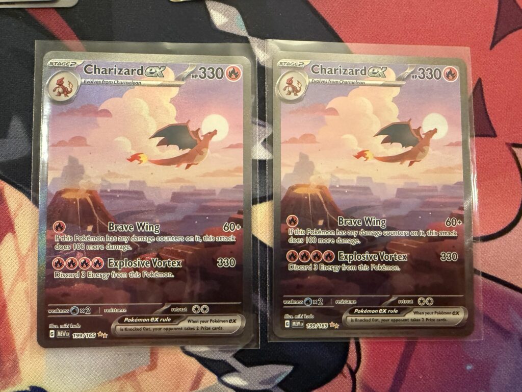 Got 2 boxes of blooming waters from the target drop last week and pulled 2 charizards