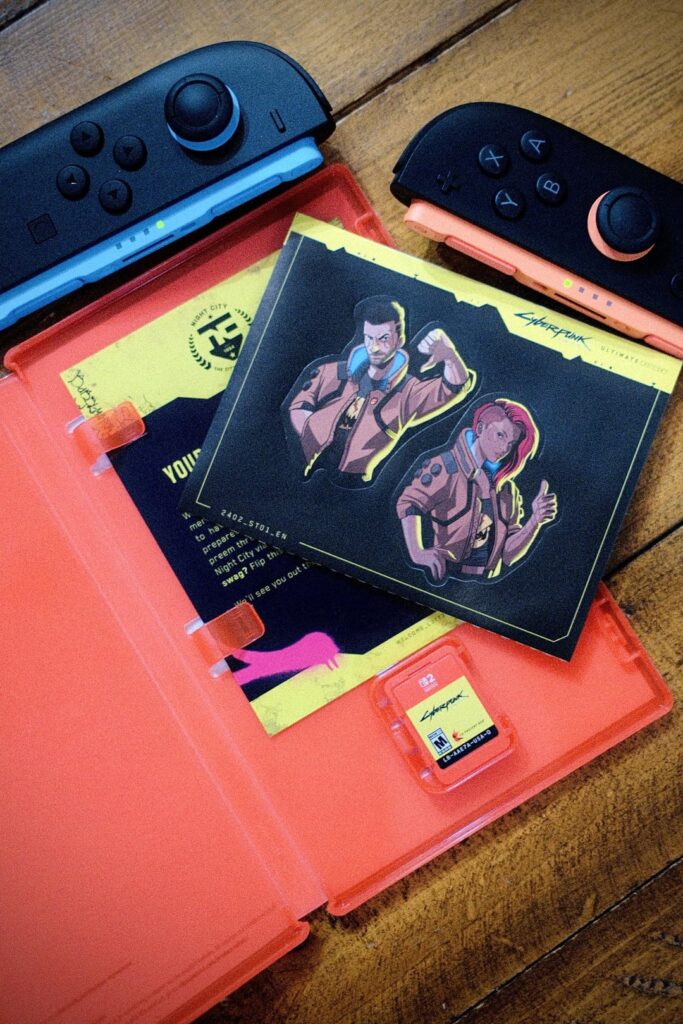 It’s rare these days to open a game box and see any sort of fun pack-ins like these Cyberpunk stickers. It goes a long way though.