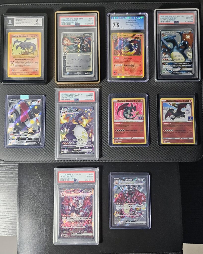 Finally completed my shiny charizard artwork set (oldest to newest)