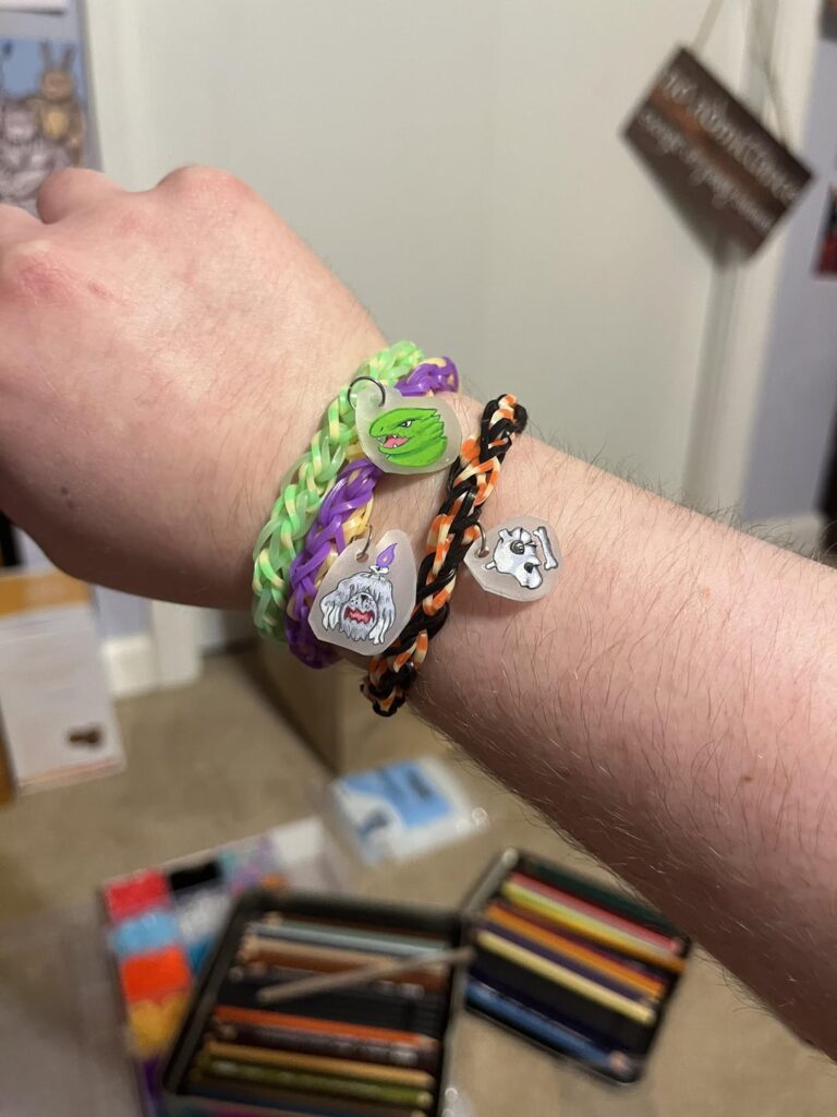 Made some pokemon charms rainbow loom bracelets with shrinky dinks : )