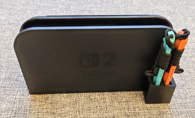 I made a 3D printable wrist wrap / skate holder for the Switch 2 dock