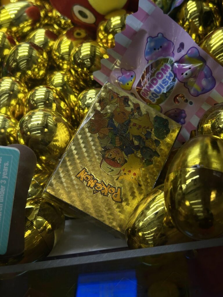Has anyone ever won one of these off-brand looking Pokémon prizes from a claw machine? If so what was inside?