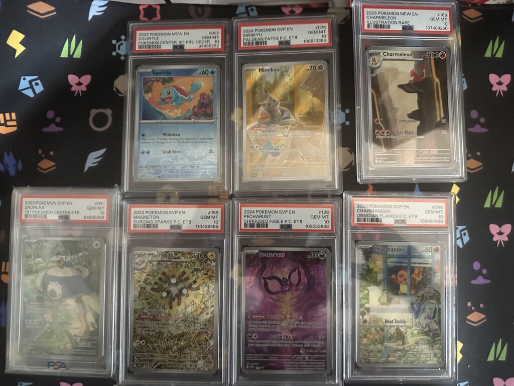 Start of my Pokemon center stamp collection. Surprise guest.