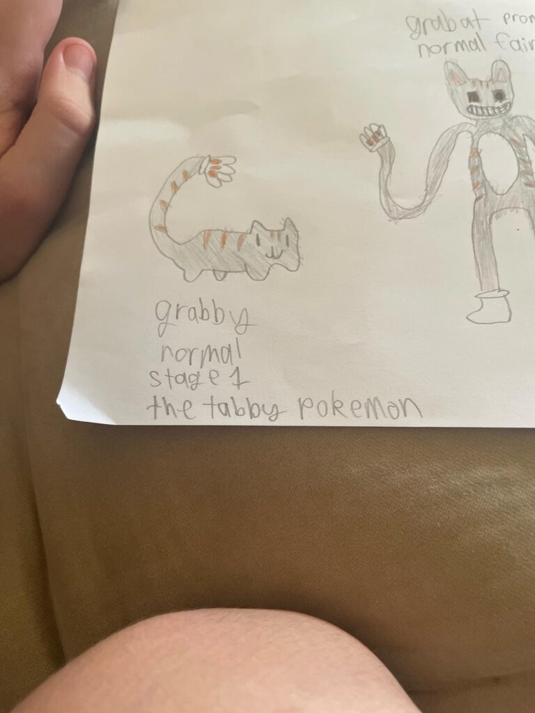 Today I made a Pokemon based on cartoon cat and a tabby cat
