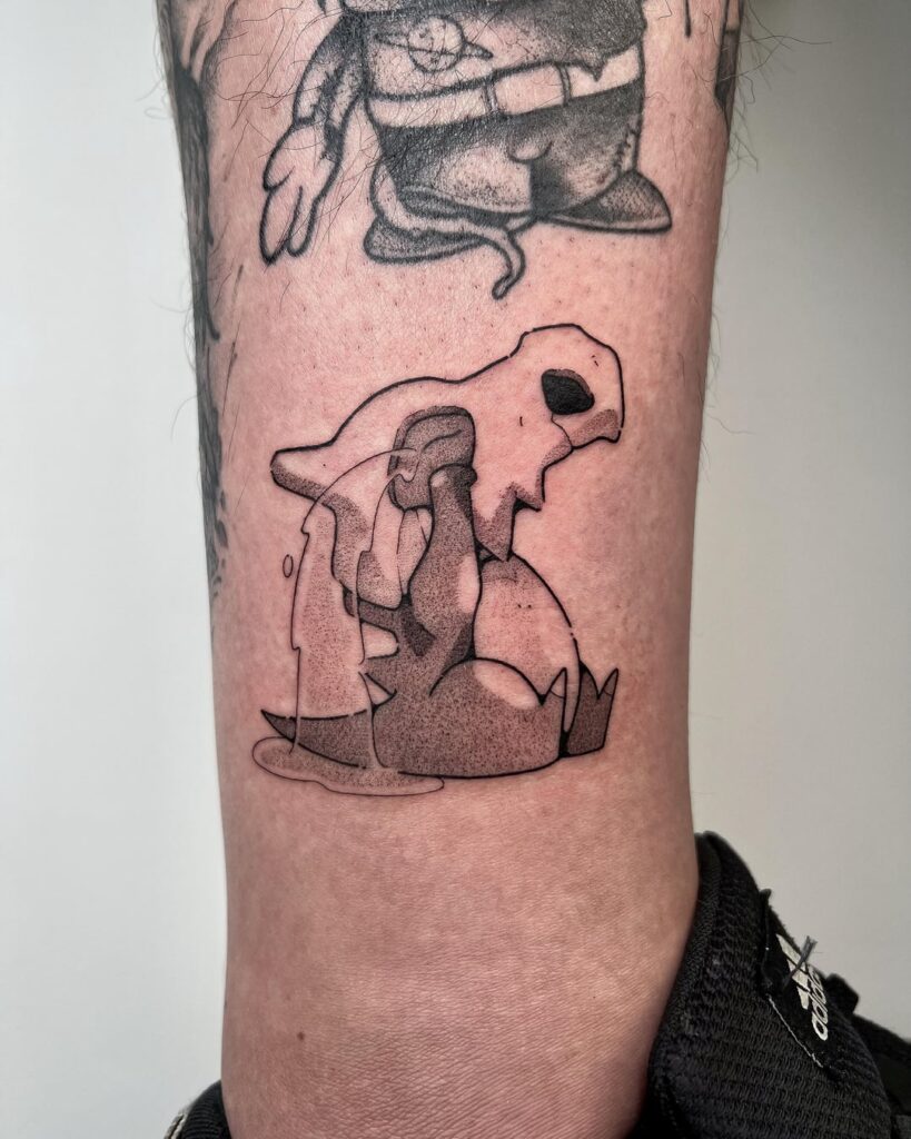 Cute crying cubone tattoo done a while ago vs healed