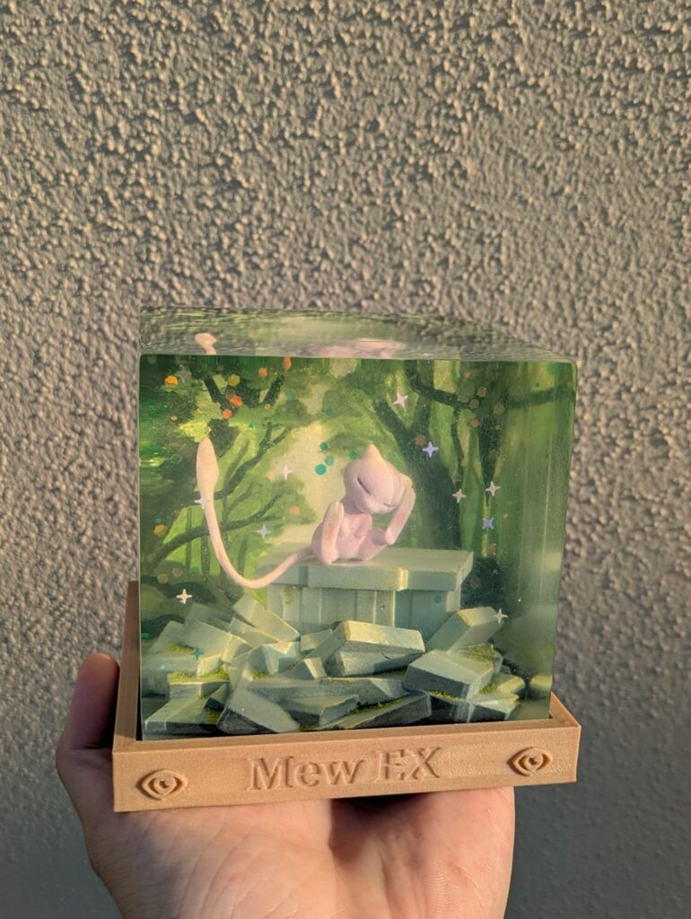 I created this diorama inspired by the Pokemon pocket Mew Ex card, what do you think?