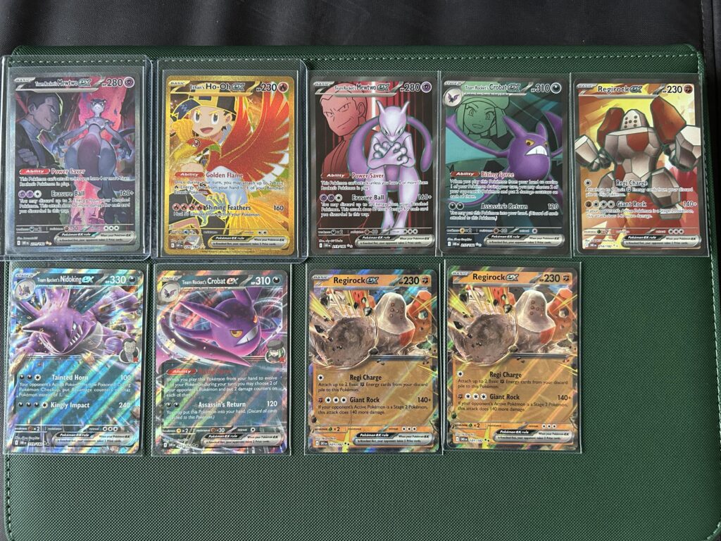 Returning to the hobby after nearly 10 years off, here's the hits from my first 20 packs (Destined Rivals). Feels like a warm welcome back!