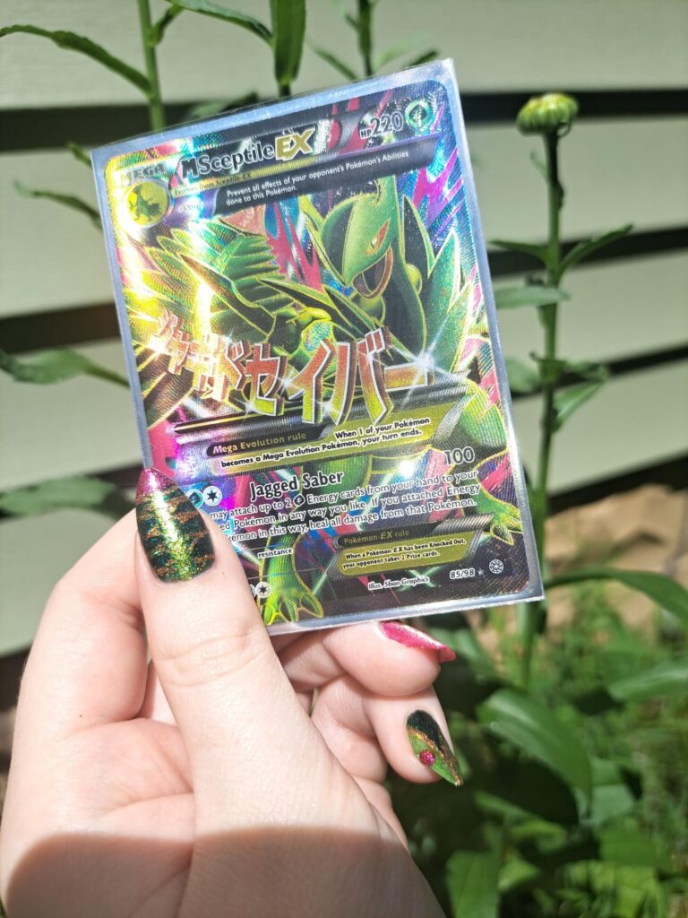 Recently did some nails based on my favorite Pokémon card 💚