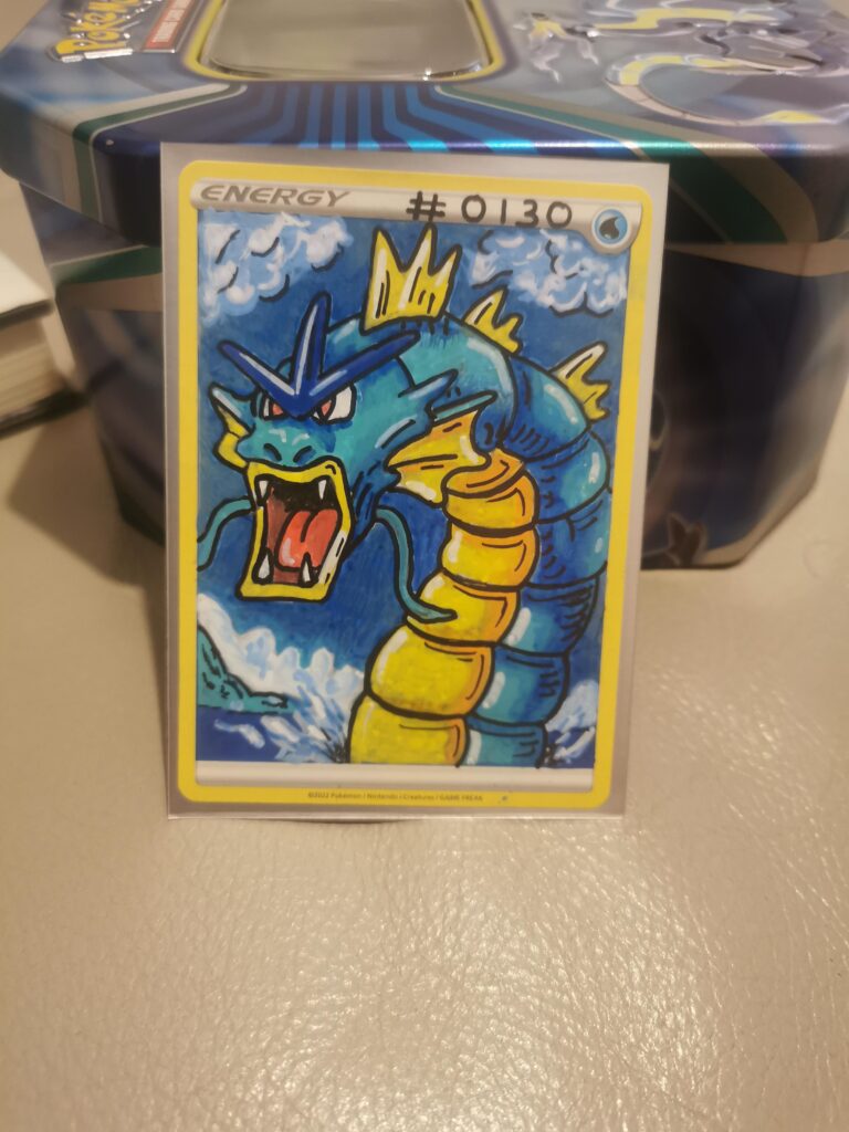 Last 1 for the night to go in my picture pokedex on (energy cards) GYARADOS #130.