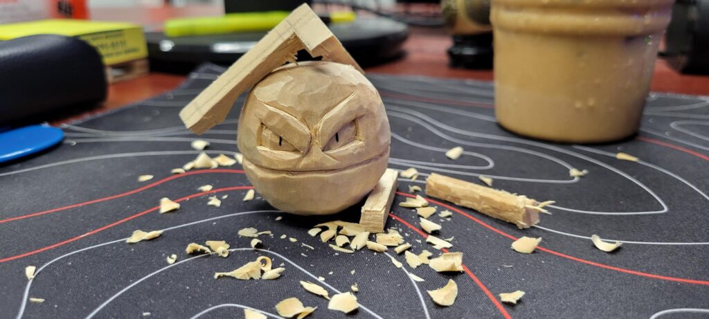 Carving wood exploded to show it was actually a VOLTORB