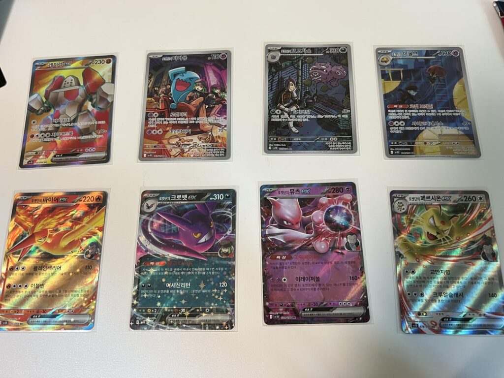 Husband and I ripped a Destined Rivals booster box. Here are the pulls!