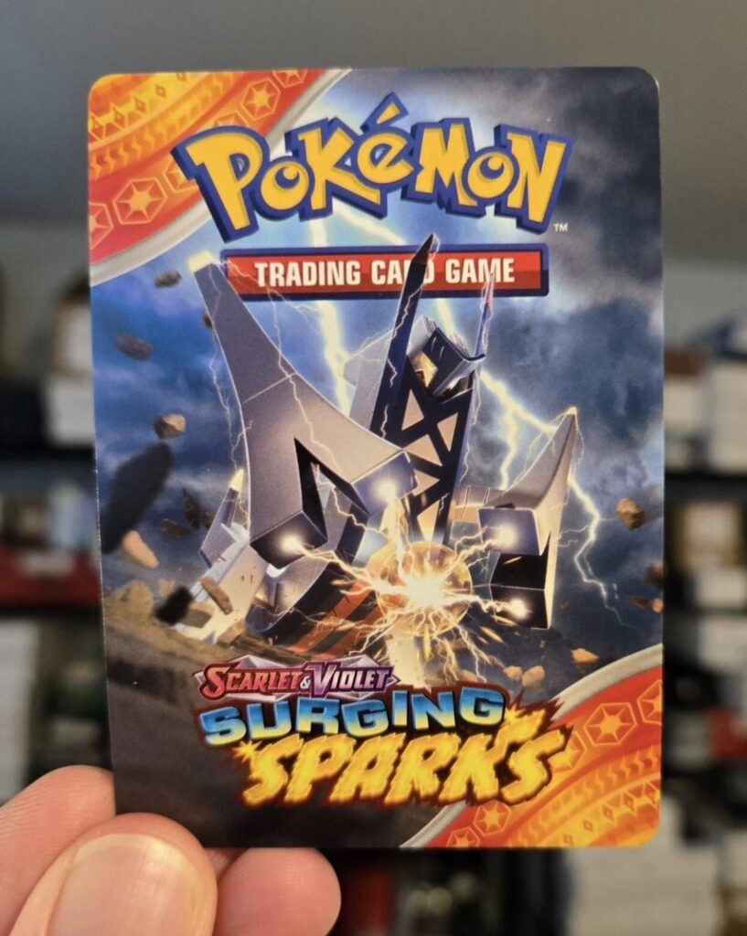 Does anyone know if this archaludon trainer tips insert card came with a specific b&b deck? Or are they random in the decks?