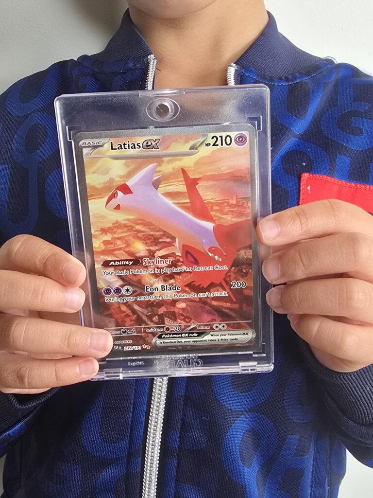 My son's first pokemon booster pack pull and he got this. Beginners luck?
