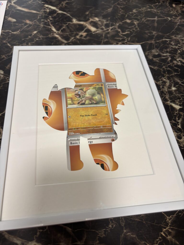 Decided to make a silhouette with my bulk cards. I was going to use multiple Rockruff but decided the energy looked better.