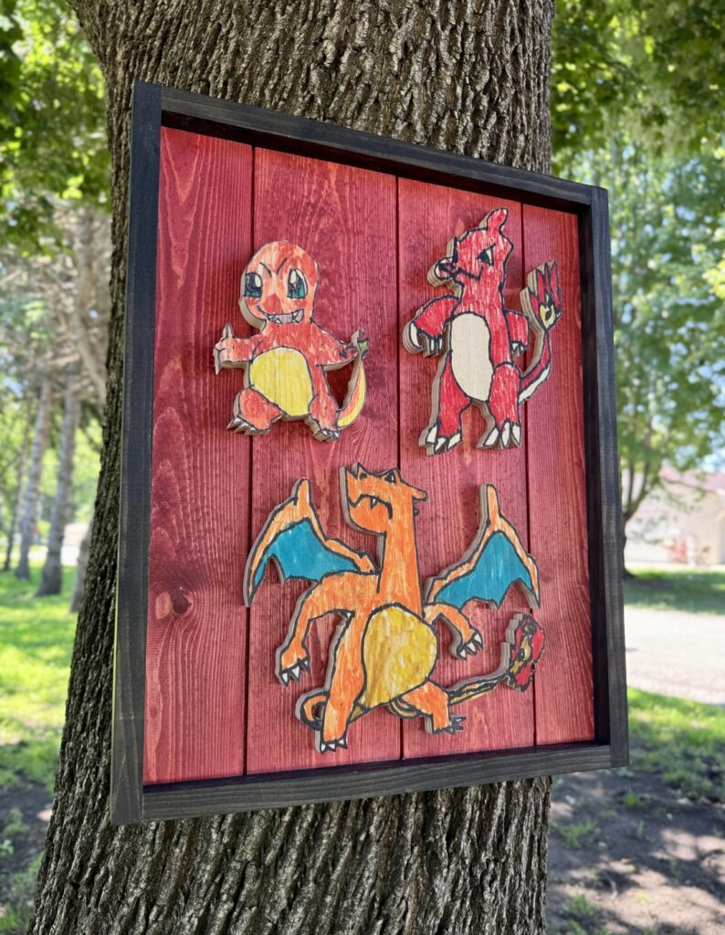 I’ve been cutting out my son’s drawings on scrap wood for the past year and finally had an extra frame laying around that fit these three perfectly