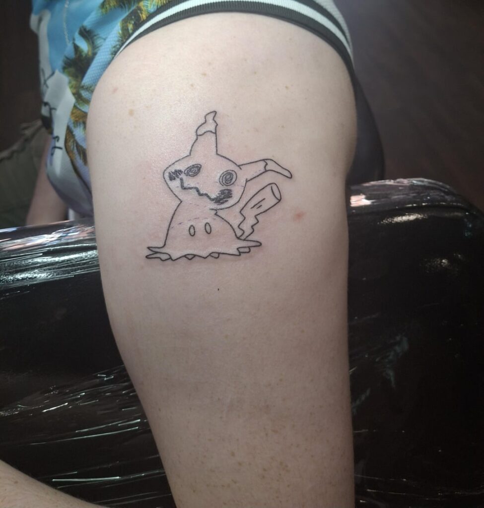I got my favourite pokemon tattooed :,)