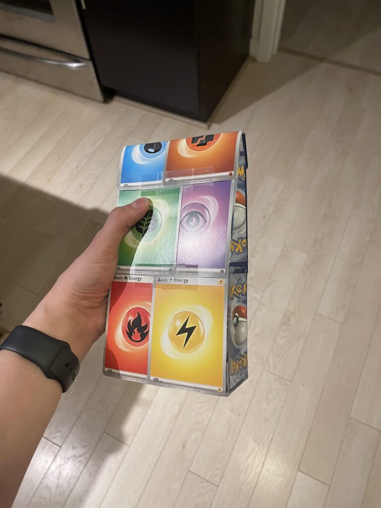I wrapped my boyfriend’s gift using Pokemon cards!