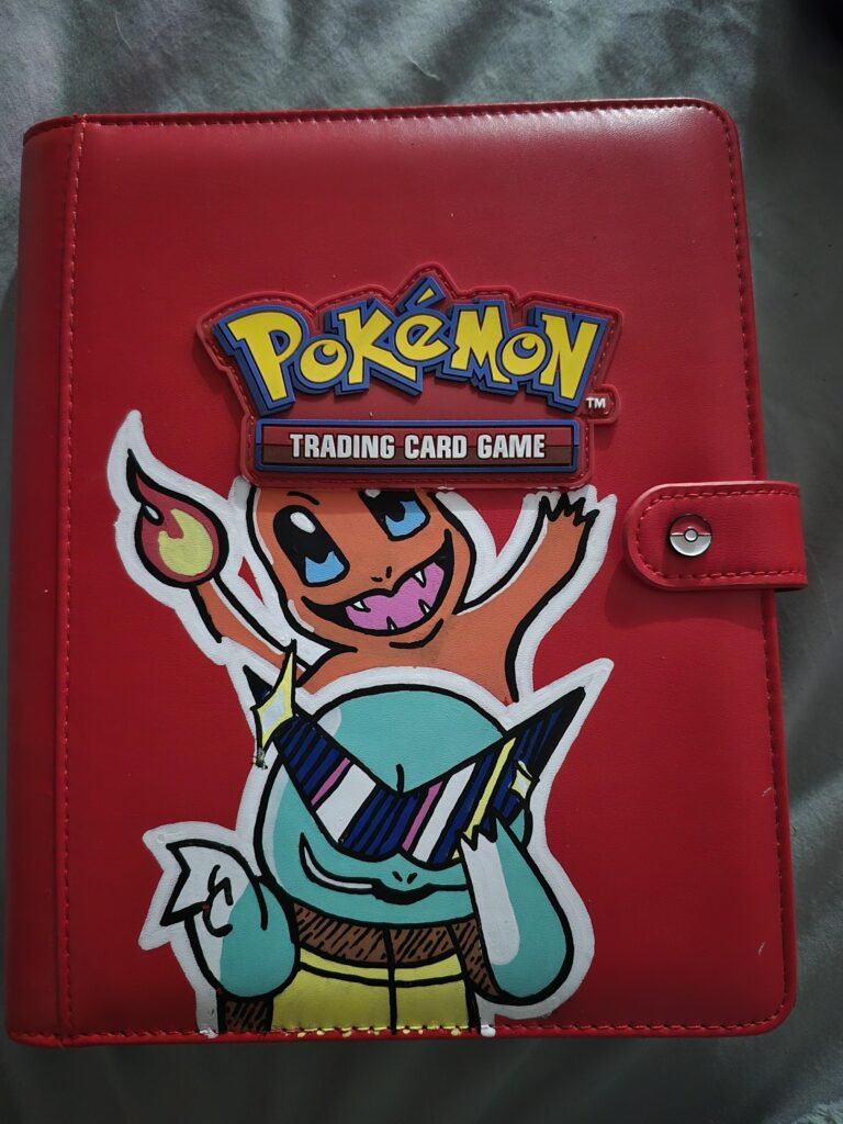 What do you think of my custom binder? I plan on adding bulbasaur and Pikachu, but I am open to creative critiques and ideas! Also I am looking for a finish coat to put on top if anyone has experience with that.