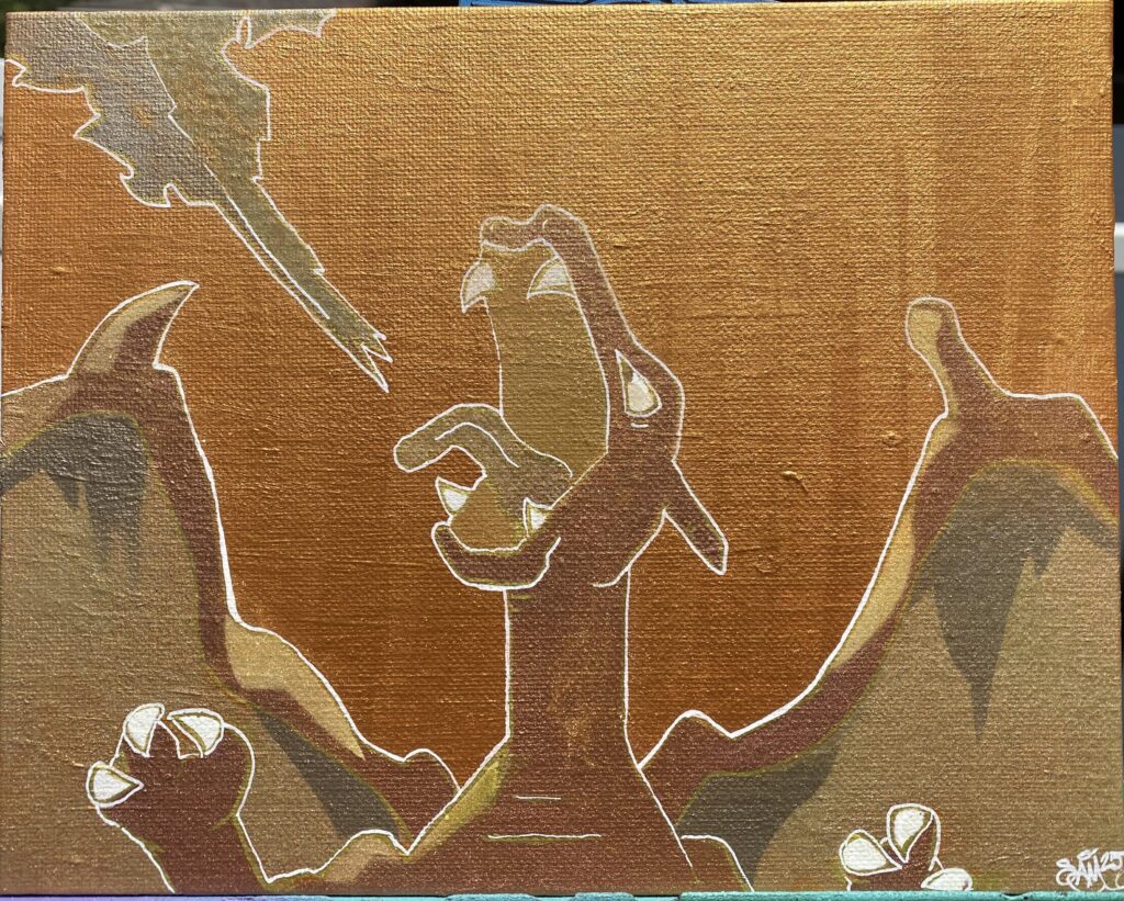 A golden Charizard made with spraypaint, a paint pen, and some powdered gold pigment