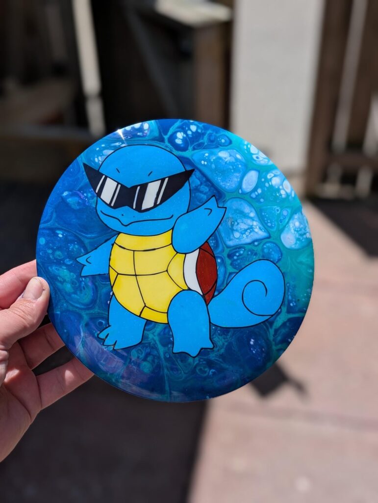 A few more Disc Golf frisbees I dyed by hand!