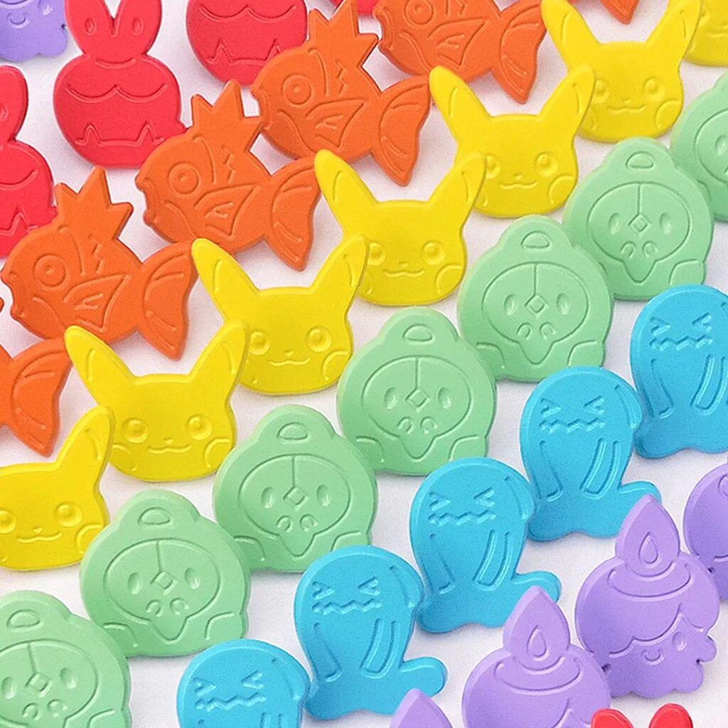 (OC) I made these mini Pokémon pins! Even if they look like hard candies, they are made of metal!