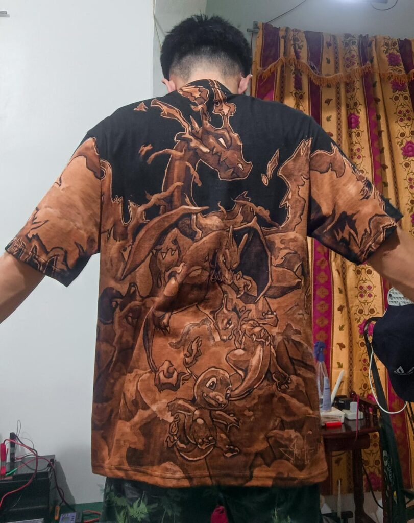 [OC] I did this Charmander art on this shirt with bleach