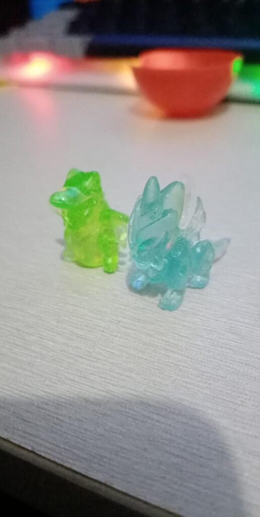 got a ripoff pokeball with these toys inside. help in ID them