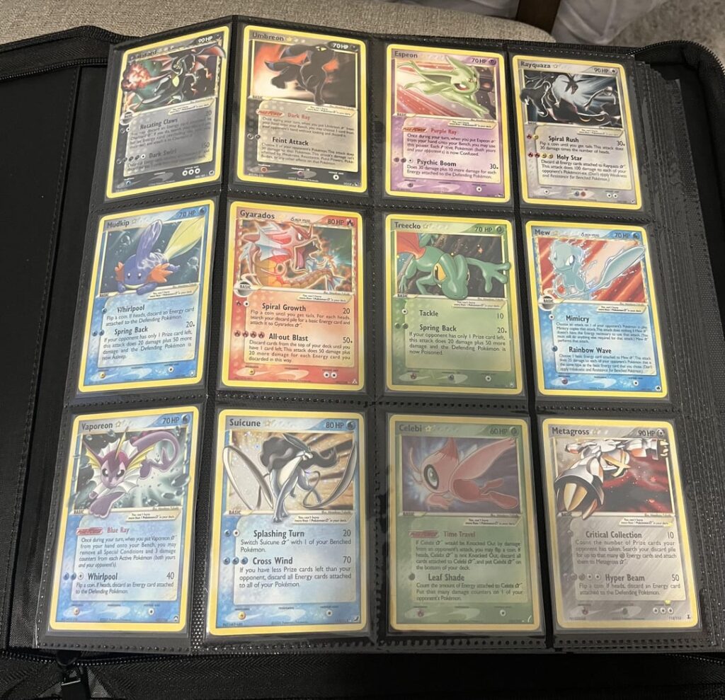 Progress on my childhood dream binder. Obsession with shinies and silver card.