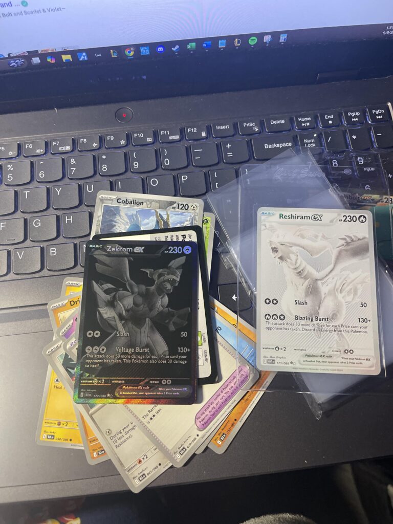 Decided to get back into Pokemon and got a Unova tin from target, cool pulls!